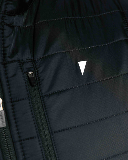 The Primo Golf Black Vest logo